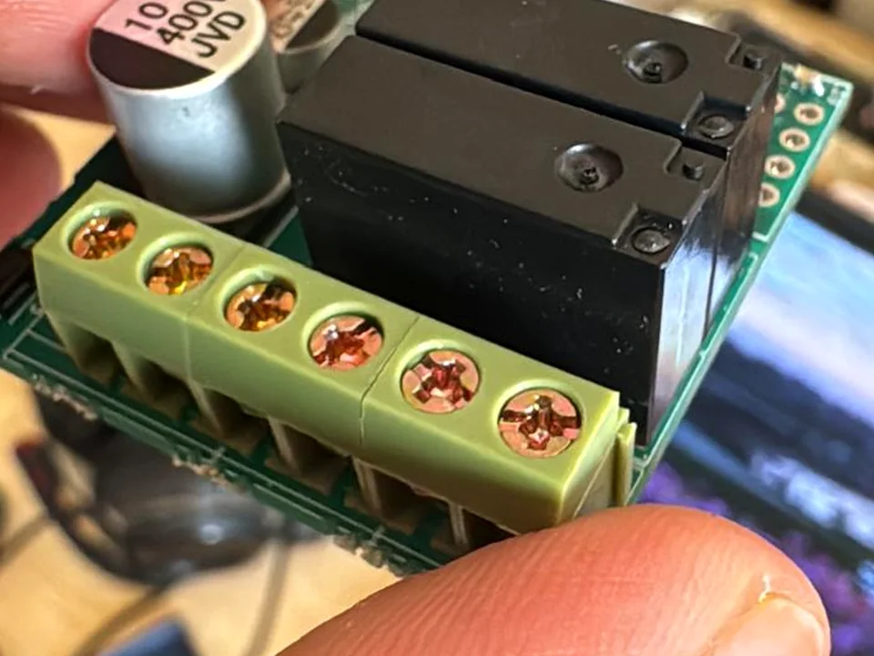 Close-up of InviSwitch relays and terminal block